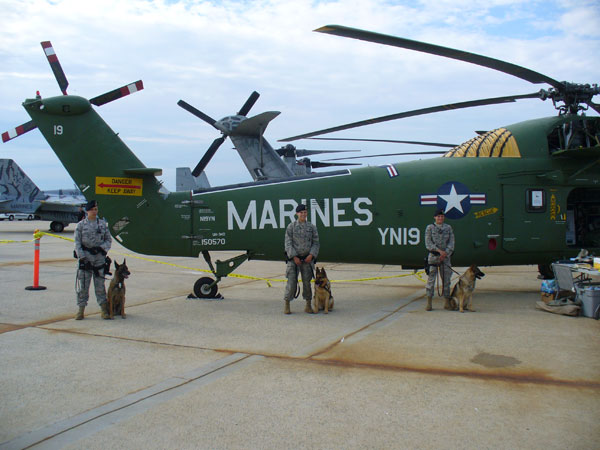 USAF K-9s and handlers next to our helicopter.